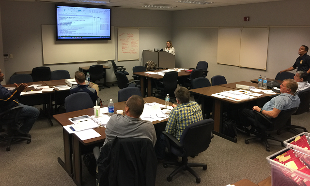 Program Manager Jennifer Kasper delivering a FLETA Fundamentals to the U.S. Mint Police