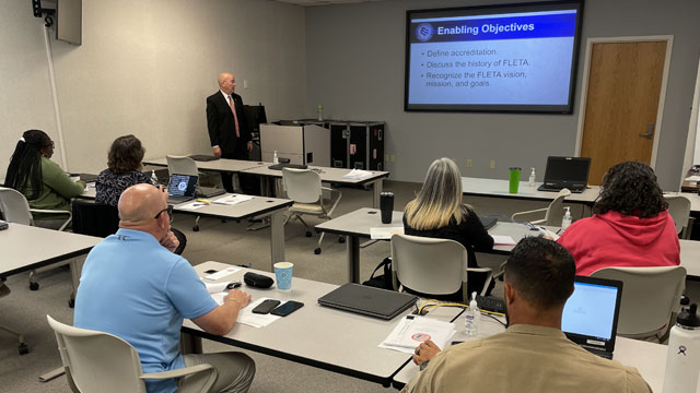 Executive Director Joe Collins delivering training to CBP AMO staff in Jacksonville, FL