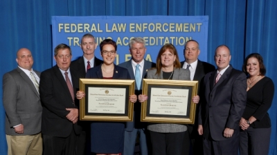 FBI Laboratory Division staff present their certificates for the Hazardous Materials Operations Course and Hazardous Material Crime Scene Operations Course FBI Laboratory Division staff present their certificates for the Hazardous Materials Operations Course and Hazardous Material Crime Scene Operations Course