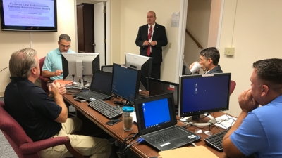 Executive Director Joe Collins welcomes the FLETA Board inspection team Executive Director Joe Collins welcomes the FLETA Board inspection team