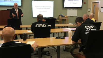 Joe Collins speaking to U.S. Customs and Border Protection Air and Marine Operations personnel Joe Collins speaking to U.S. Customs and Border Protection Air and Marine Operations personnel