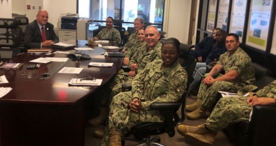 FLETA Executive Director Joseph Collins meets with members of the Navy staff