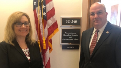 Jennifer Kasper and Joe Collins outside Senate Committee Auguast 29, 2019