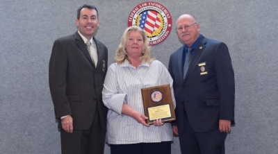 FLETA Board Chair, Brian Peters; Kimberly Canitz; FLETA Office of Accreditation Executive Director, Gary Mitchell, Ph.D. FLETA Board Chair, Brian Peters; Kimberly Canitz; FLETA Office of Accreditation Executive Director, Gary Mitchell, Ph.D.