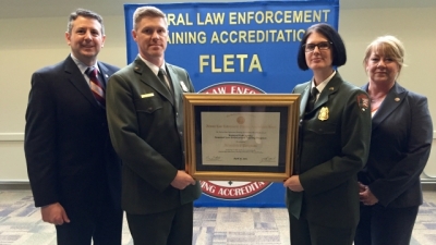 Members from the National Park Service receive their certificate of reaccreditation Members from the National Park Service receive their certificate of reaccreditation