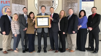 Representatives from the United States Courts hold the FLETA Accreditation Certificate Representatives from the United States Courts hold the FLETA Accreditation Certificate