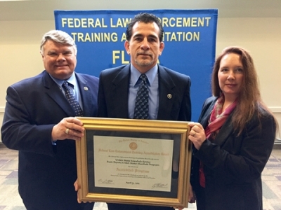 members of the United States Marshals Service receive their certificate of reaccreditation for their program members of the United States Marshals Service receive their certificate of reaccreditation for their program