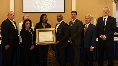USPIS receive their certificate of accreditation USPIS receive their certificate of accreditation