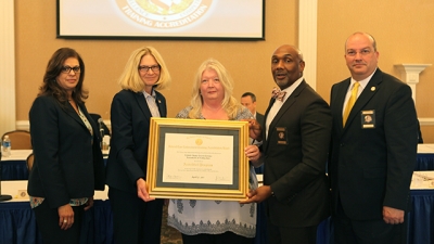 members of the U.S. Secret Service receive the certificate of accreditation members of the U.S. Secret Service receive the certificate of accreditation