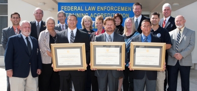 D. Ovadia; J. Lowder; B. Brown; M. Latham; Dominick Braccio, A.D.; J. Minix; Connie Patrick, Director, The FLETC; L. Bennett; J. DuPont; Cindy Atwood, A.D.; T. Lopez; Kevin Livingston, CoS/A.D.; J. Clipse; S. Hemenway; R. Dionne; and, M. Evans D. Ovadia; J. Lowder; B. Brown; M. Latham; Dominick Braccio, A.D.; J. Minix; Connie Patrick, Director, The FLETC; L. Bennett; J. DuPont; Cindy Atwood, A.D.; T. Lopez; Kevin Livingston, CoS/A.D.; J. Clipse; S. Hemenway; R. Dionne; and, M. Evans