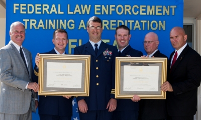 Alan Wheaton, Curriculum Chief; Cmdr. Thomas Walsh, Commanding Officer, MLEA; Cmdr. Paul Baker, Dep Dir of Training Evaluations at the White House; Lt. Brett Gary, MLEA; Rick Giovengo, Accreditation Mgr; and, Terry Walsh, Assist Trng Officer Alan Wheaton, Curriculum Chief; Cmdr. Thomas Walsh, Commanding Officer, MLEA; Cmdr. Paul Baker, Dep Dir of Training Evaluations at the White House; Lt. Brett Gary, MLEA; Rick Giovengo, Accreditation Mgr; and, Terry Walsh, Assist Trng Officer