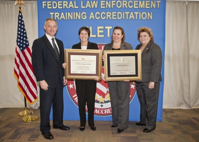Clifford Holly, Deputy Assistant Director, FBI Training Division; Donna Folmar, FBI Academy Accreditation Manager; Cheree Hammond, FBI Academy Mgmt Prgm Analyst; and, Catherin Fletcher, FBI Academy Section Chief Clifford Holly, Deputy Assistant Director, FBI Training Division; Donna Folmar, FBI Academy Accreditation Manager; Cheree Hammond, FBI Academy Mgmt Prgm Analyst; and, Catherin Fletcher, FBI Academy Section Chief
