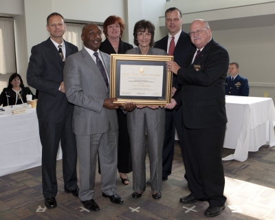 Ronald Ward, FLETA Board Chair, Domenic McClinton, Assist Dir, Sally Livingston, Accreditation Mgr, Andrea Oliver, Supervisory Academy Instructor, Danny Auer, Director, IRS Nat Criminal Investigation Trng Academy Ronald Ward, FLETA Board Chair, Domenic McClinton, Assist Dir, Sally Livingston, Accreditation Mgr, Andrea Oliver, Supervisory Academy Instructor, Danny Auer, Director, IRS Nat Criminal Investigation Trng Academy